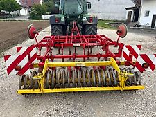 Pöttinger Synkro 3003 Grubber 3m Schneidringwalze Flügelschar